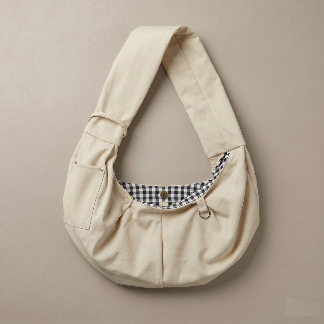 Dog Sling Carrier light apricot flat lay on neutral surface — Kosient